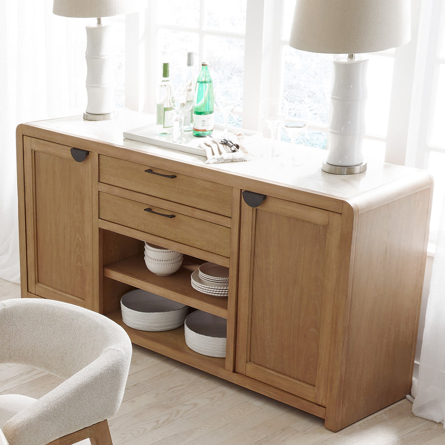 Add style and storage to your dining space with the easygoing vibe of this eye-catching buffet.