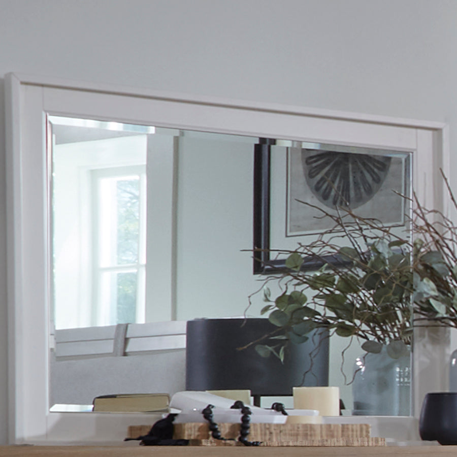 Expertly crafted from poplar solids and birch veneers, this mirror boasts a fresh, hand-painted cotton finish that exudes timeless charm. The select woods are kiln-dried to ensure long-lasting beauty and minimize warping and splitting. The beveled mirror in a shadow box frame adds a unique and distinctive touch to any room in your home.